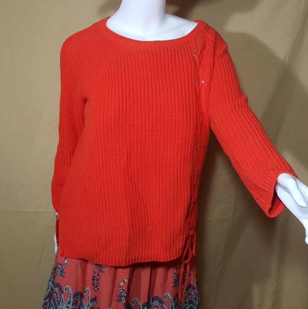 Beautiful orange sweater with lace up details